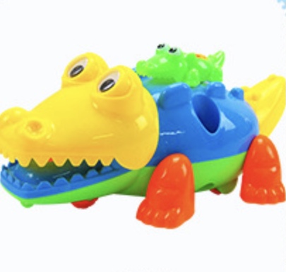 Puzzle  model crocodil din plastic ce se poate asambla și des asambla cu o șurubelniță tot din plastic având piese mari ce se poate și trage cu sfoară indicat copiilor de trei ani + 1 produs non toxic 